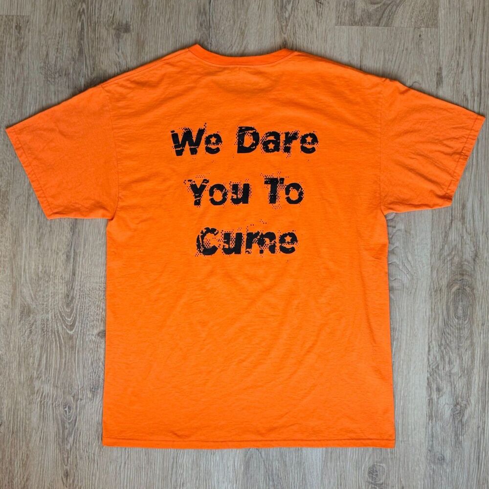 Deja Vu Showgirls “We Dare You To Cume” Double-Sided Tee – L